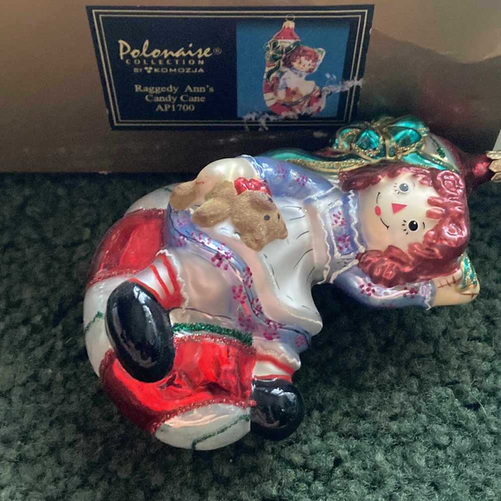 Raggedy Ann’s candy cane polonaise Adler retired Christmas ornament. NOS